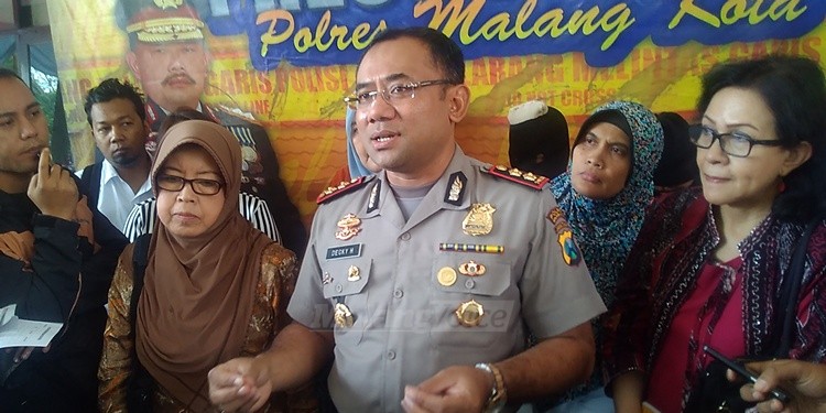 Kapolres Malang Kota, AKBP Decky Hendarsono bersama pemerhati anak. (deny)
