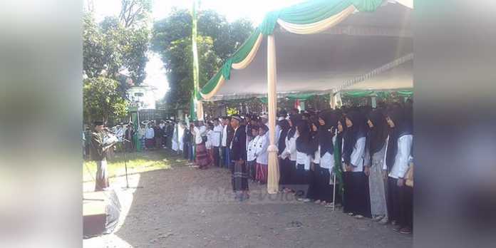Suasana apel peringatan Hari Santri Nasional di halaman Museum Brawijaya, Kota Malang. (Muhammad Choirul)