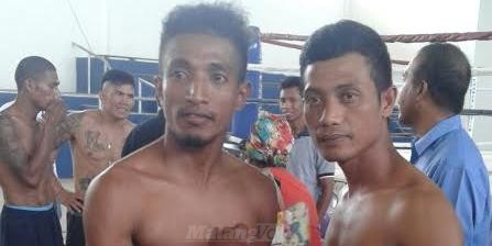 Sis Morales (kanan) dan Benar Mino Belo usai sesi timbang badan di Lospalos Gymnasium, Jumat (25/11) pagi waktu setempat.