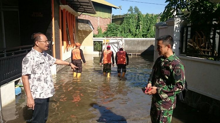Banjir di Perumahan De Cluster Nirwana belum surut hingga Kamis (12/1). (Muhammad Choirul)