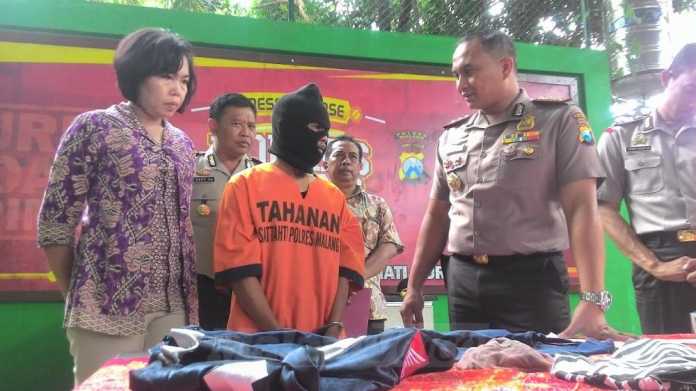 Kapolres Malang,AKBP Yade Setiawan Ujung, saat rilis kasus pemerkosaan.(miski)