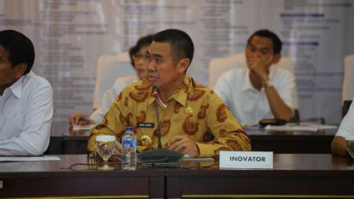 Wali Kota Malang, HM Anton, menyampaikan presentasi Lapobra di ajang Kompetisi Inovasi Pelayanan Publik. (ist)