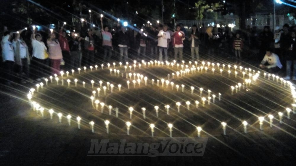VIDEO: Aksi 1.000 Lilin Untuk ER Berlangsung Khidmat