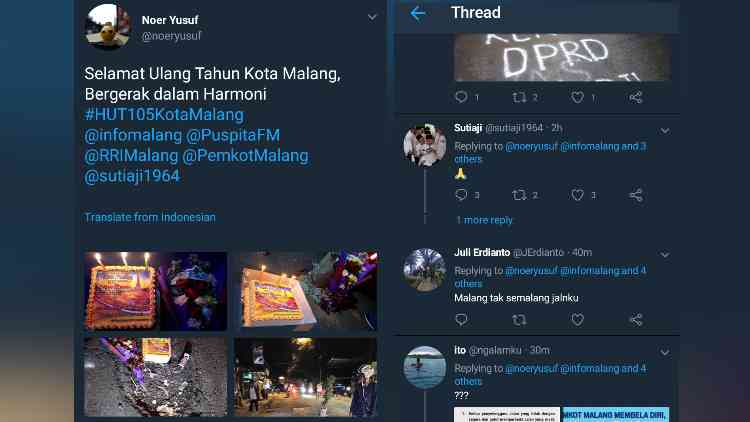 Warga Rayakan HUT 105 Tahun Kota Malang dengan Kue Tar di Jalan Berlubang