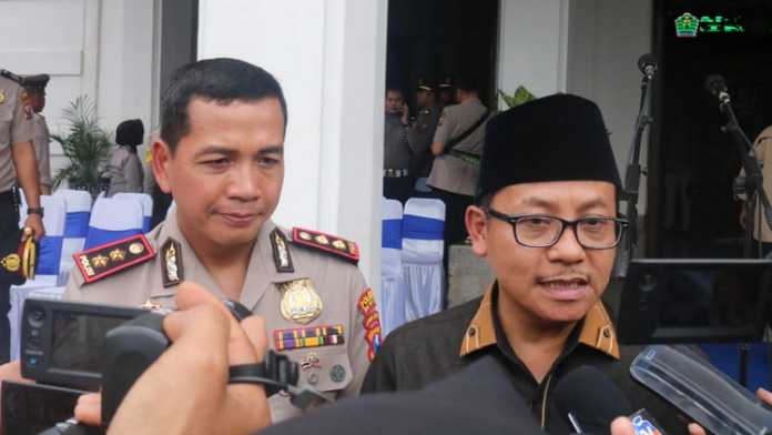 Kapolresta Malang Kota AKBP Leonardus Simarmata bersama Wali Kota Malang Sutiaji. (Aziz Ramadani MVoice)