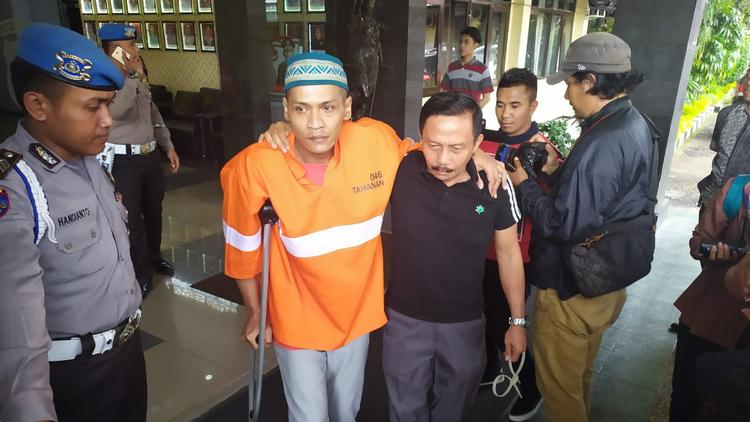 Tahanan kabur yang kembali ditangkap anggota Polresta Malang Kota. (deny rahmawan)