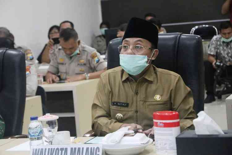 Wali Kota Malang Sutiaji saat rapat kordinasi secara online di Mapolresta Malang Kota. (Humas Pemkot Malang)