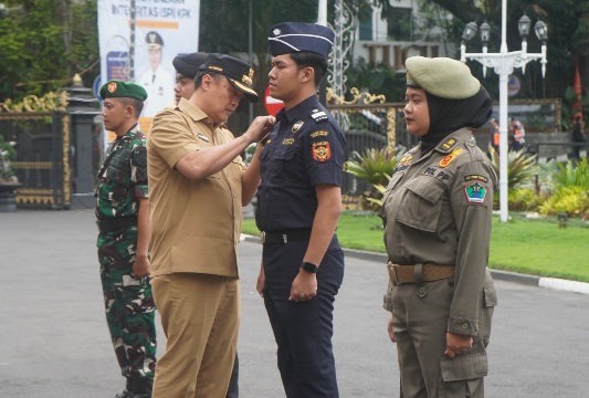 Kirab Pataka Jer Basuki Mawa Beya Tiba di Malang, Usung Semangat Pilkada Damai dan Gempur Rokok Ilegal